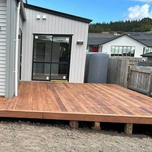 Deck Builders North Shore reviewing site plans on a Takapuna property