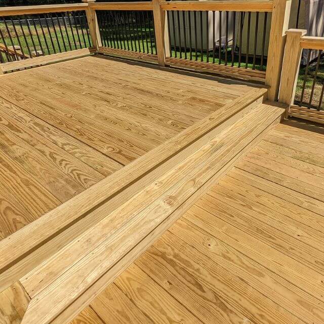 Finished hardwood deck showcasing premium craftsmanship